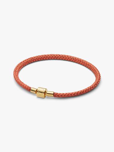 Skimrande orange textilarmband