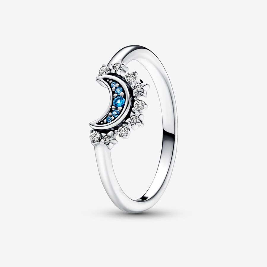 Glittrande måninspirerad ring med blå stenar image number 0