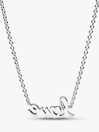 Halsband med glittrande kärleksbudskap