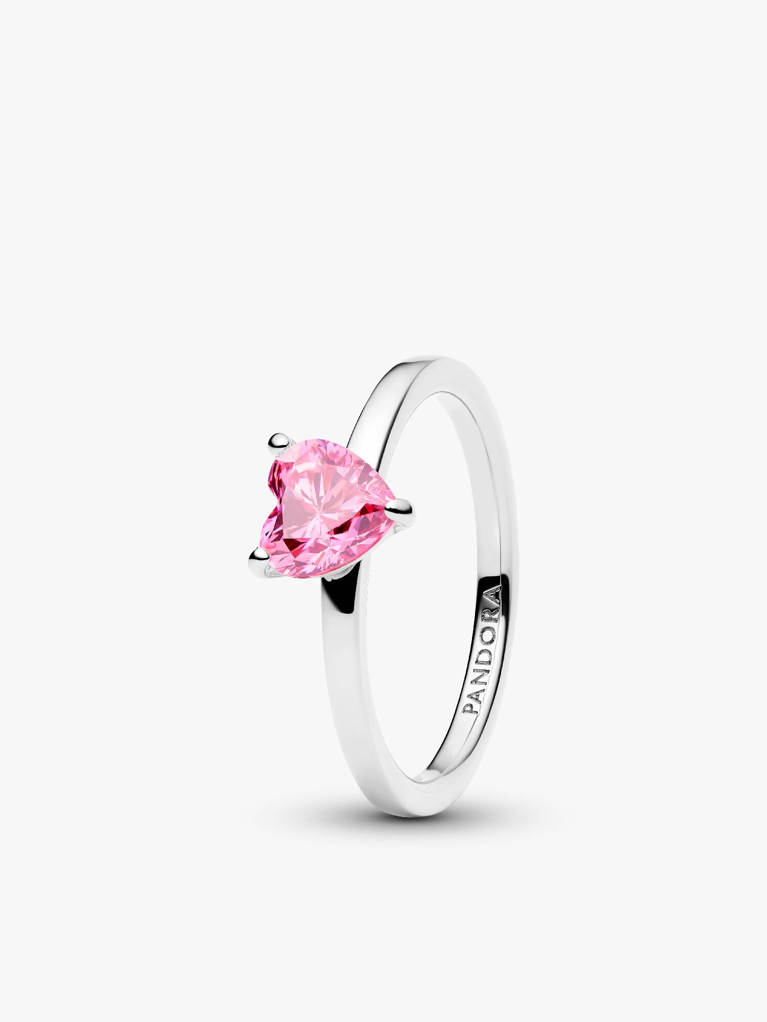 Solitärring med glittrande rosa hjärta