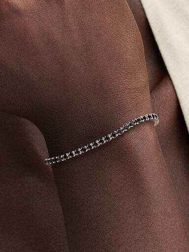 Svart glittrande tennisarmband