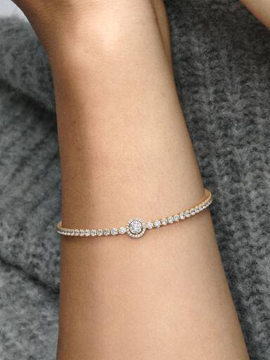 Tennisarmband med glittrande halo