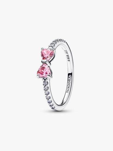 Ring med rosettformad design och två rosa stenar