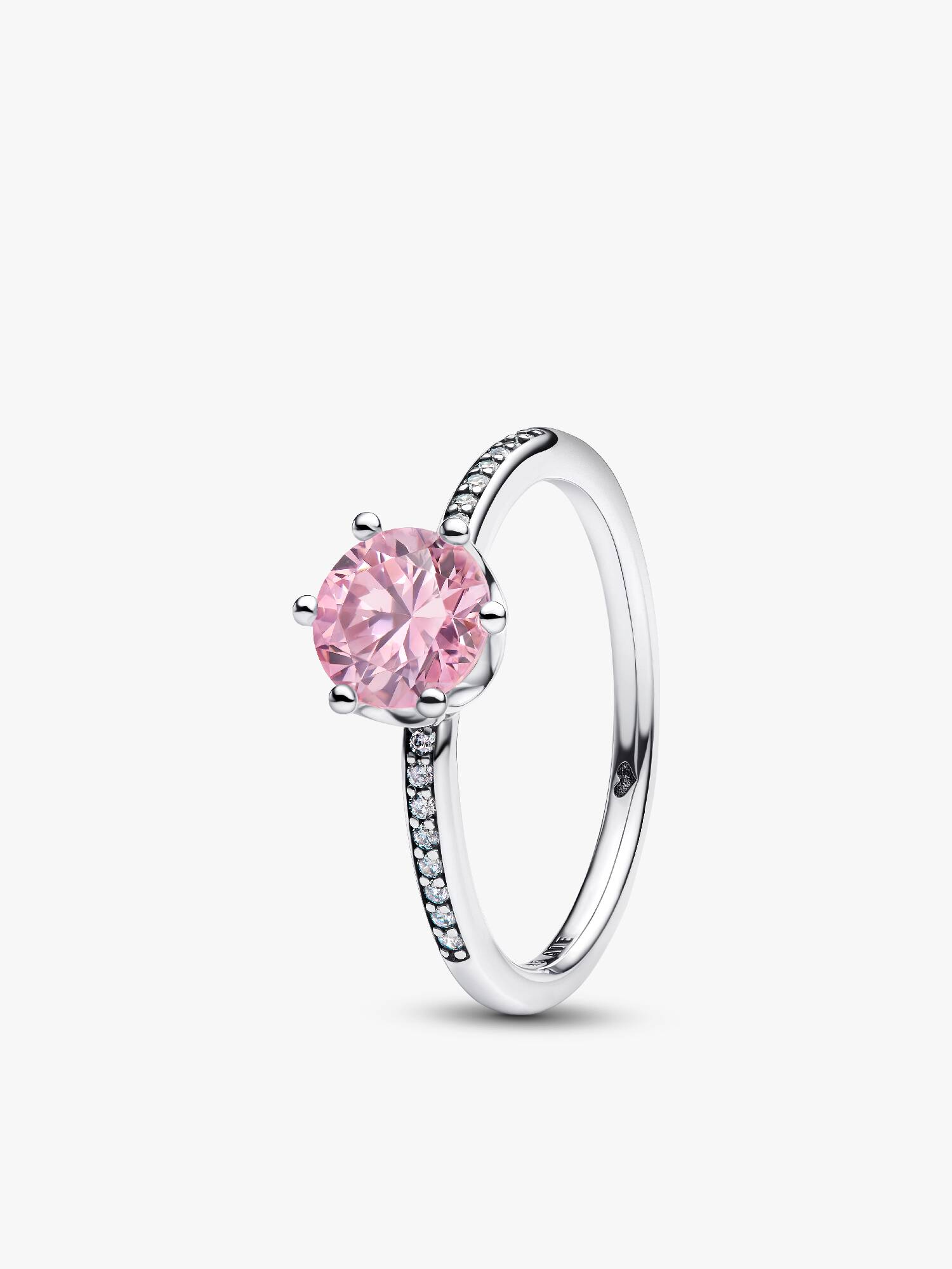 Solitärring med rosa glittrande sten