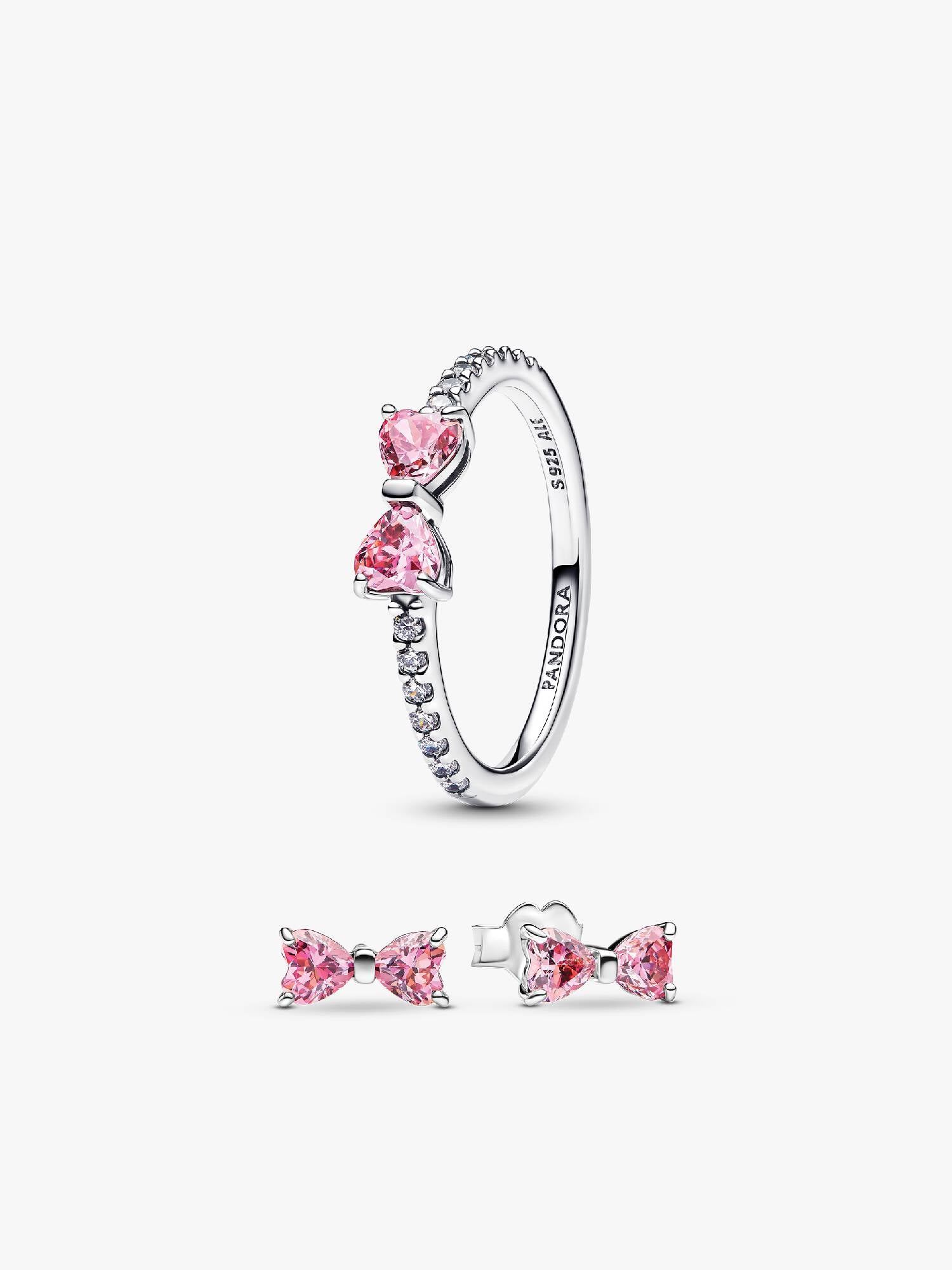 Glittrande rosa ringar med rosett