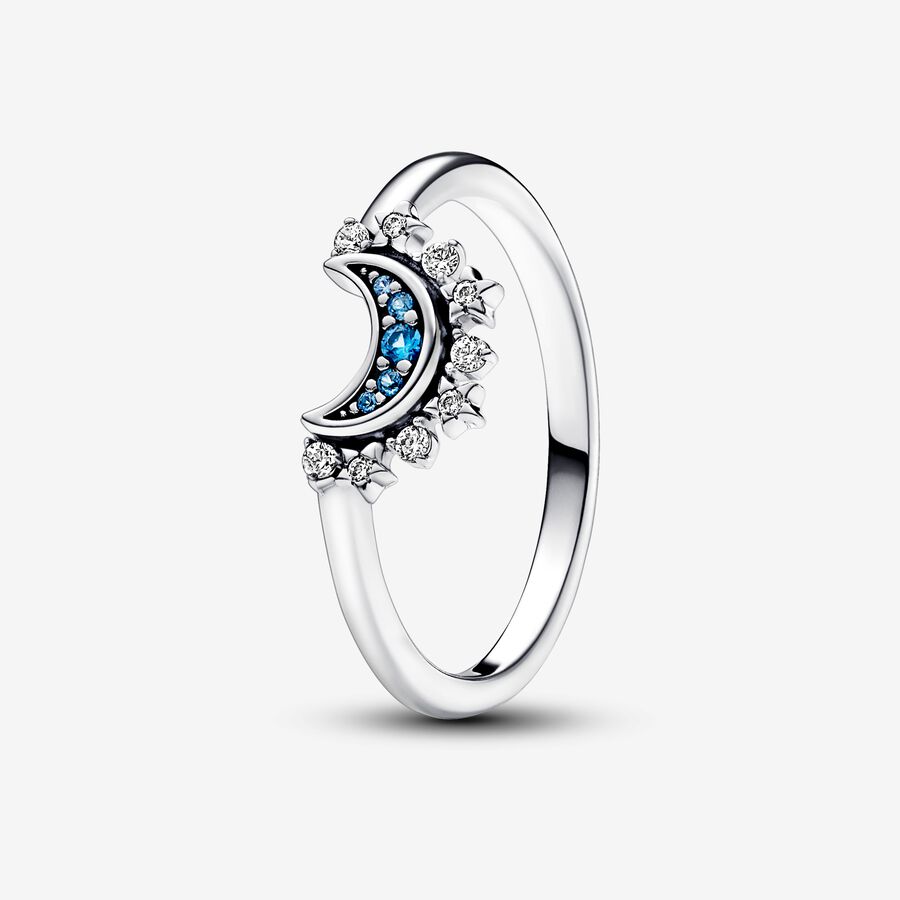 Glittrande måninspirerad ring med blå stenar image number 0