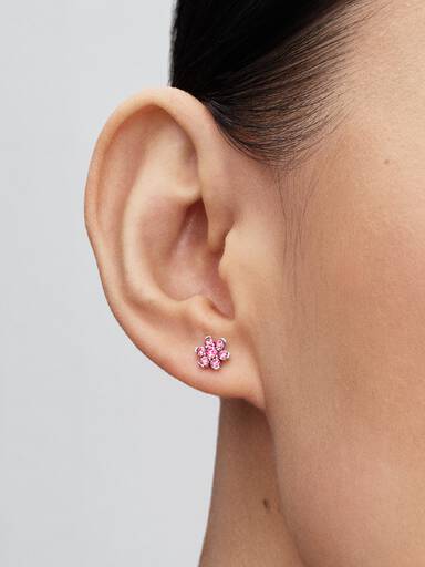 Stiftörhängen med glittrande rosa blomma