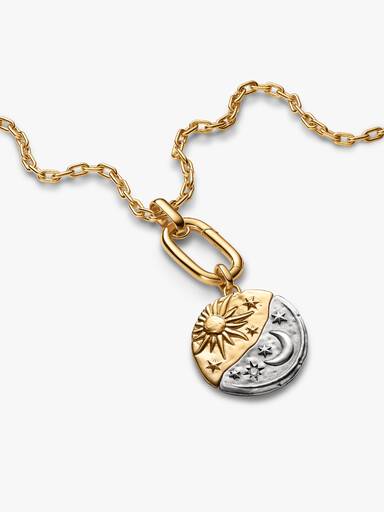 Stor medaljongberlock med sol och måne