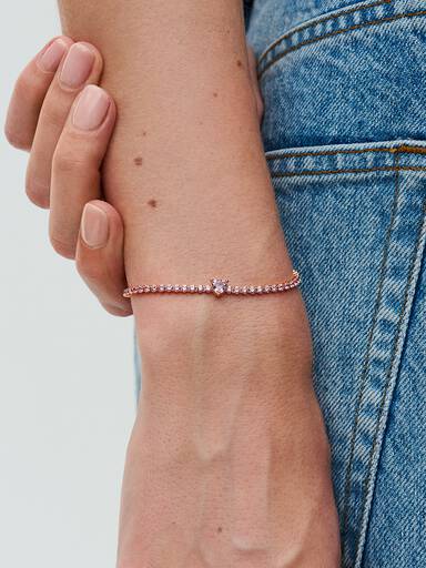 Tennisarmband med glittrande hjärta