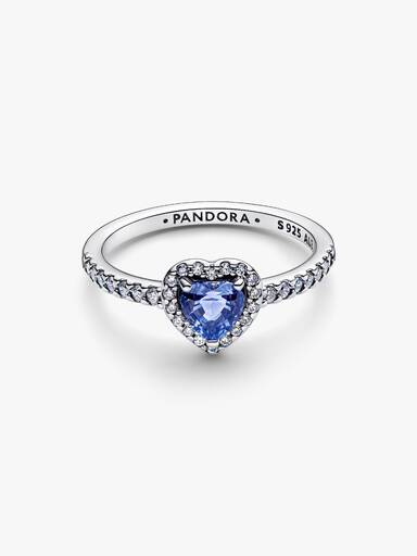 Ring med glittrande hjärta