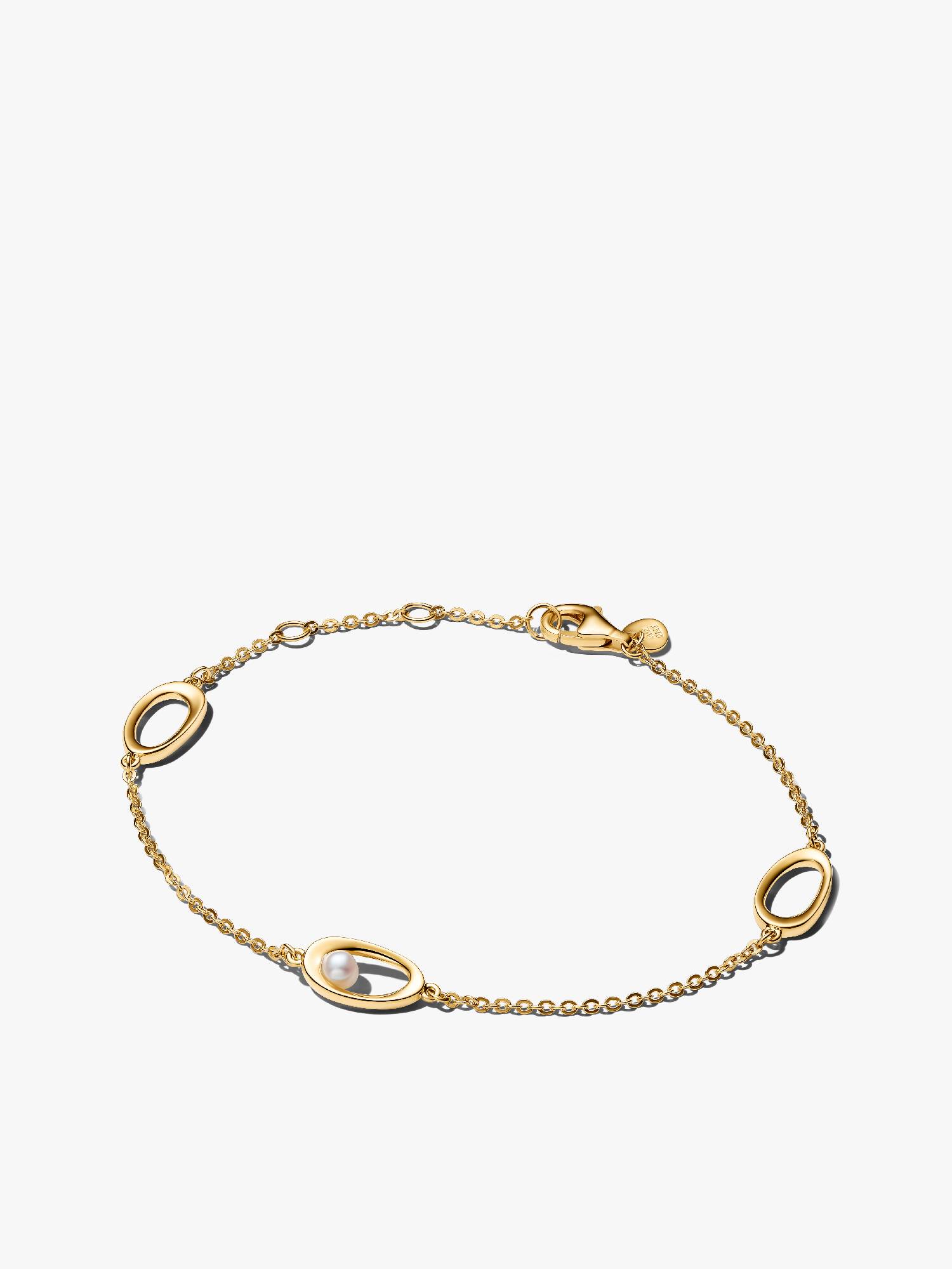 Organiskt format och ovalt armband med behandlade och odlade sötvattenspärlor 