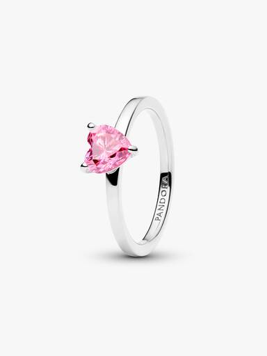 Solitärring med glittrande rosa hjärta