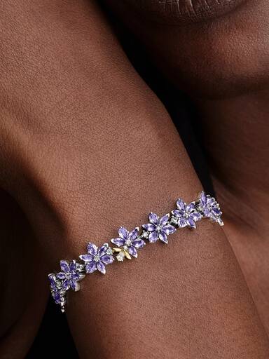 Bridgerton tennisarmband med blomma och bi