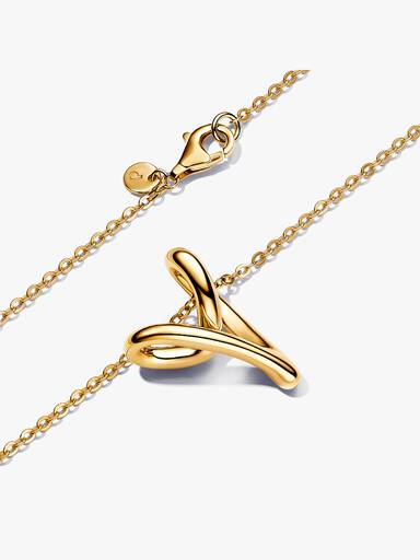 Halsband med hängsmycke i form av ett organiskt hjärta