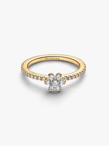 Ring med glittrande blomma