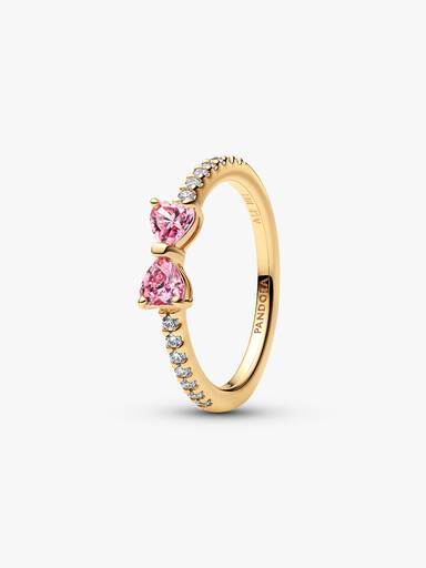 Ring med rosettformad design och två rosa stenar