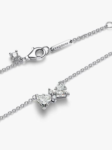 Halsband med glittrande rosett