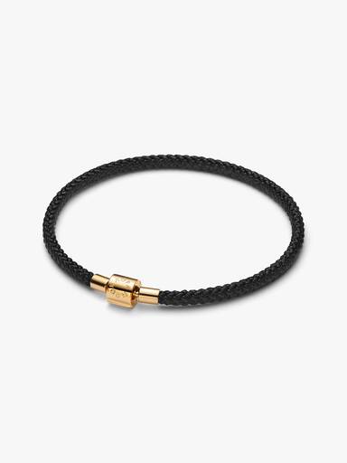 Skimrande svart manchesterarmband