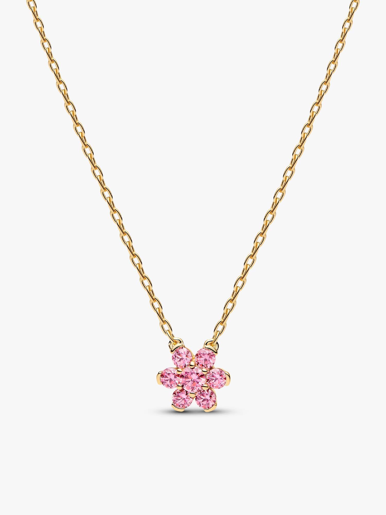 Halsband med hängsmycke och glittrande rosa blomma