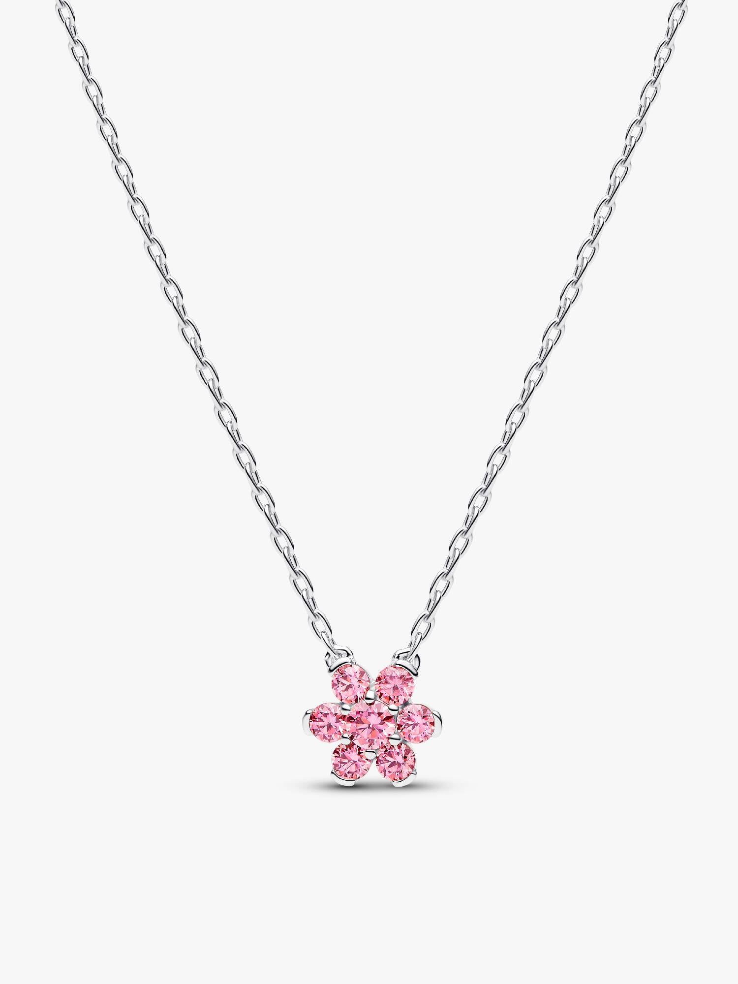 Halsband med hängsmycke och glittrande rosa blomma
