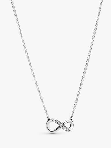 Glittrande halsband med evighetssymbol