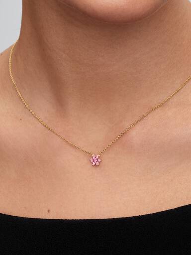 Halsband med hängsmycke och glittrande rosa blomma