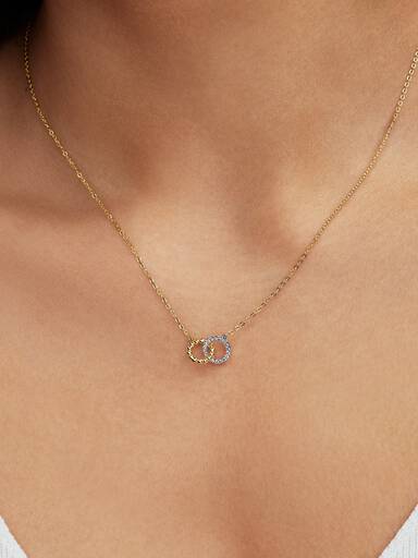 Halsband med sammanflätade cirklar, pärlade detaljer och pavéinfattning