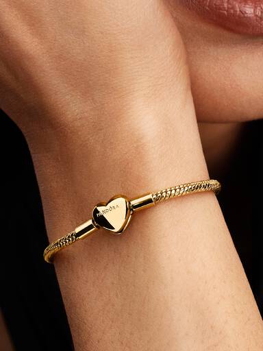 Facetterat ormkedjearmband med hjärtlås
