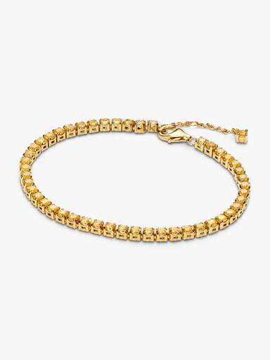 Glittrande gult tennisarmband
