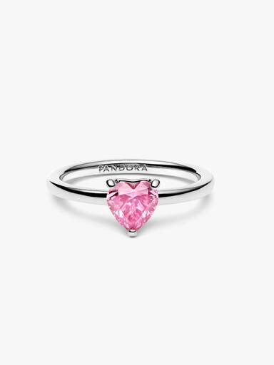 Solitärring med glittrande rosa hjärta