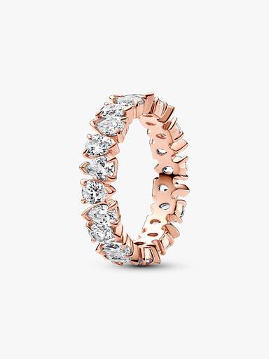 Glittrande ring med slingrande stenar