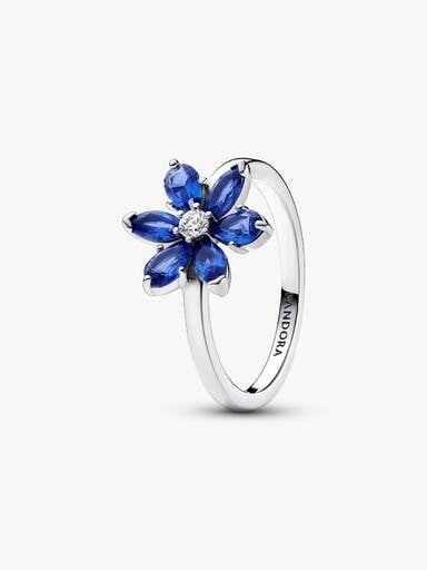 Ring med glittrande blomma