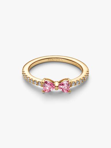 Ring med rosettformad design och två rosa stenar