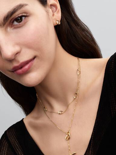 Organiskt format och ovalt halsband med behandlade och odlade sötvattenspärlor