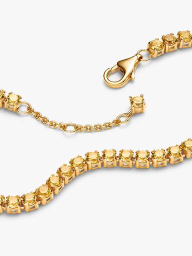 Glittrande gult tennisarmband