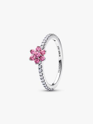 Ring med glittrande rosa blomma