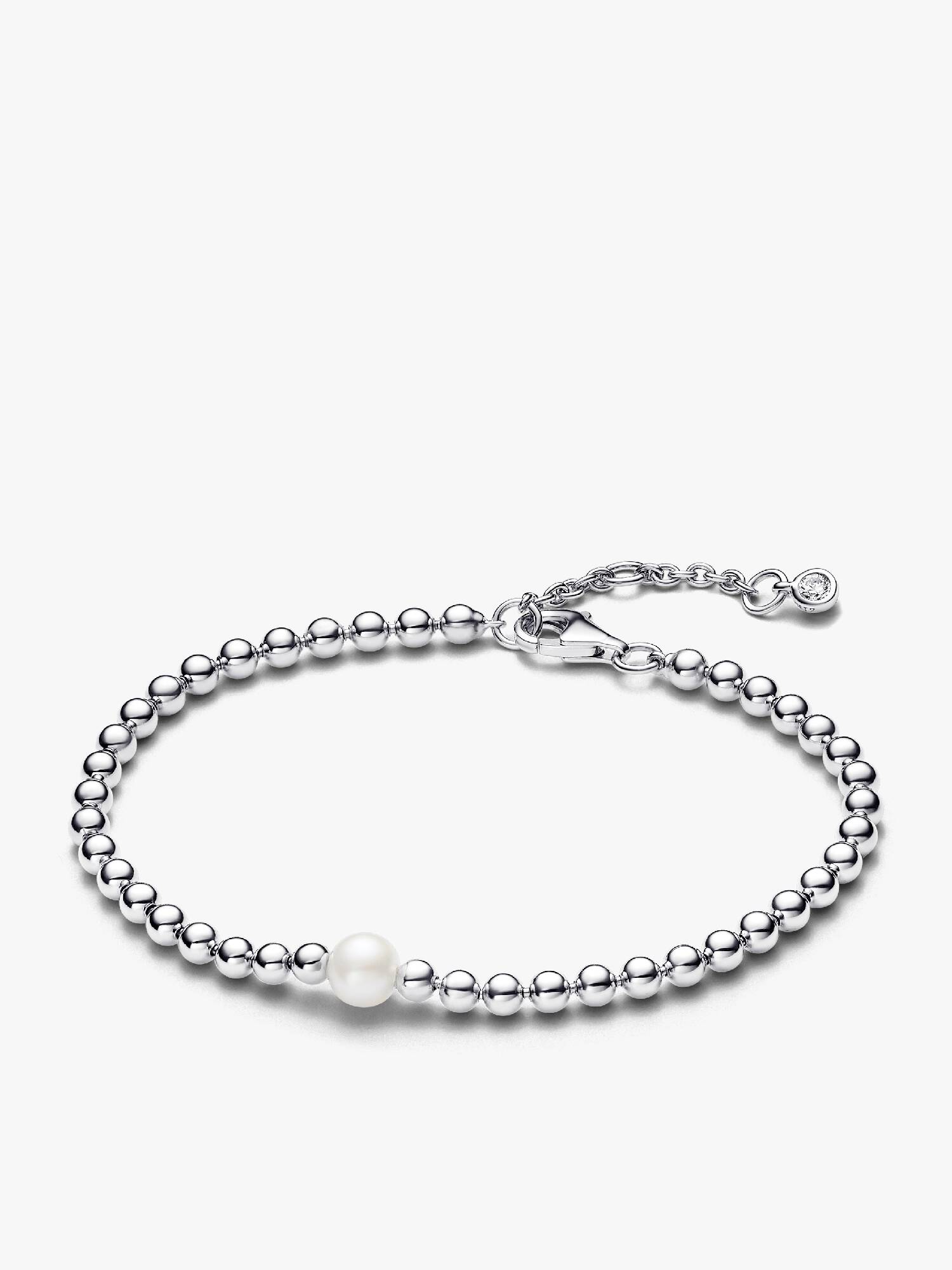 Armband med behandlad sötvattensodlad pärla och metallpärlor