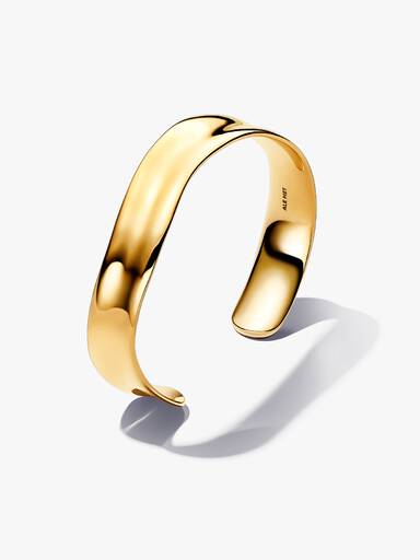 Organiskt formad armring i öppen design