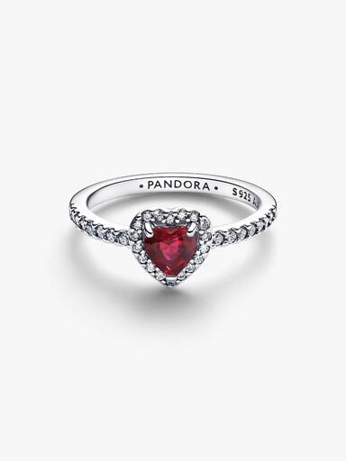 Ring med röd hjärtformad sten