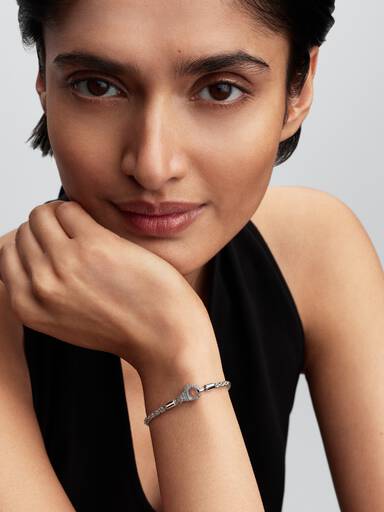 Skirt berlockarmband med glittrande lås