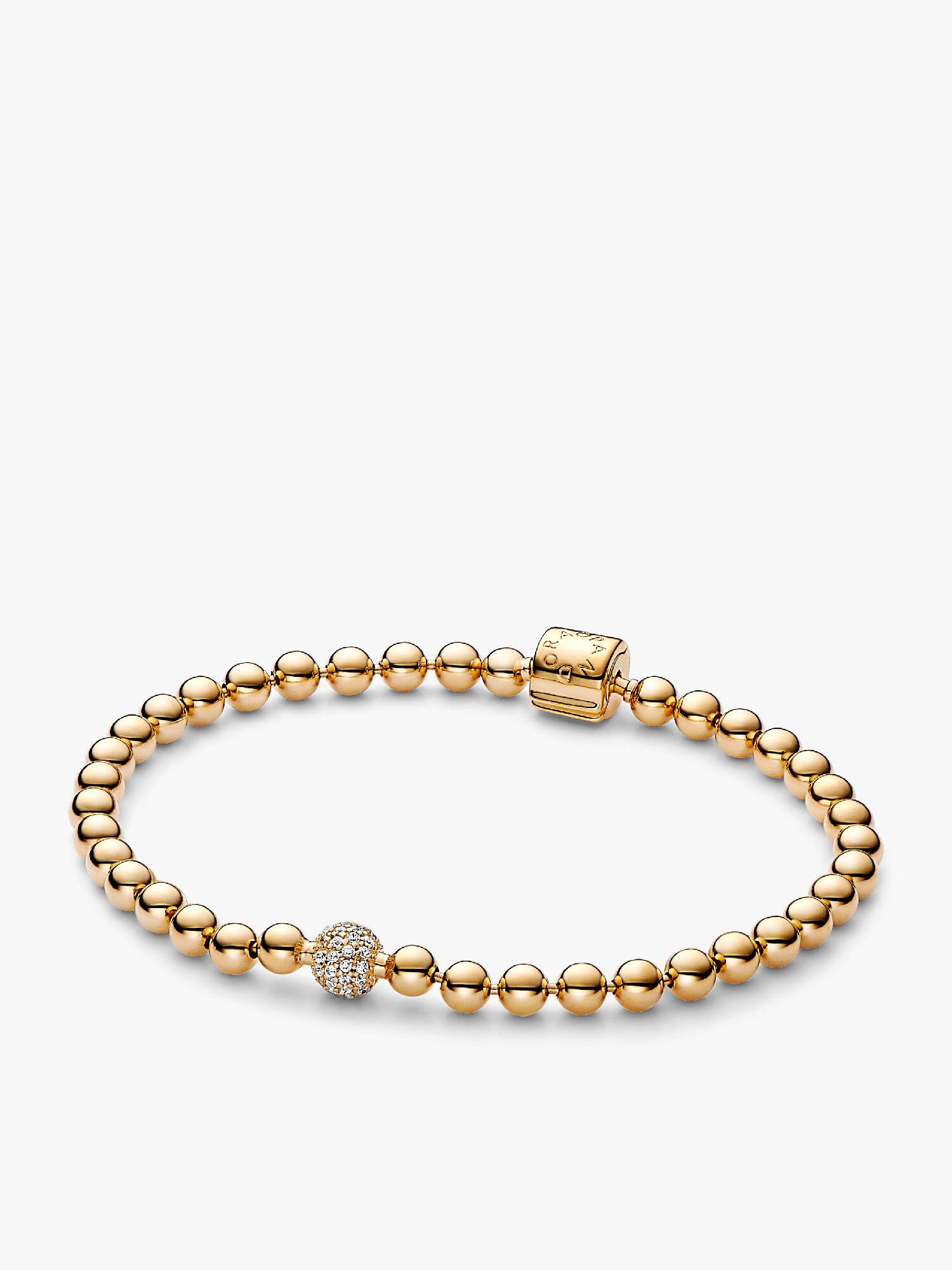 Pärlat armband med glittrande lås