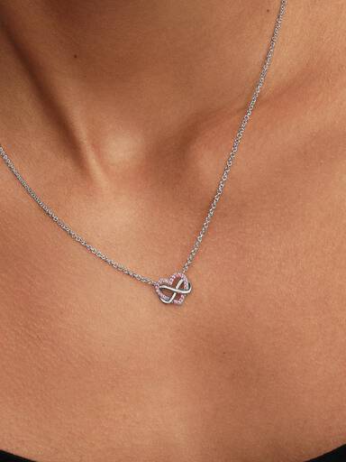 Collierhalsband med gnistrande rosa hjärta i oändlighetsdesign