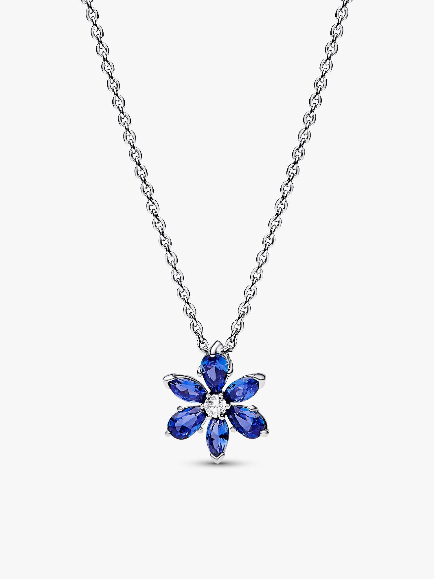 Halsband med glittrande blått hängsmycke