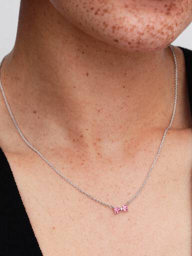 Halsband med rosetter