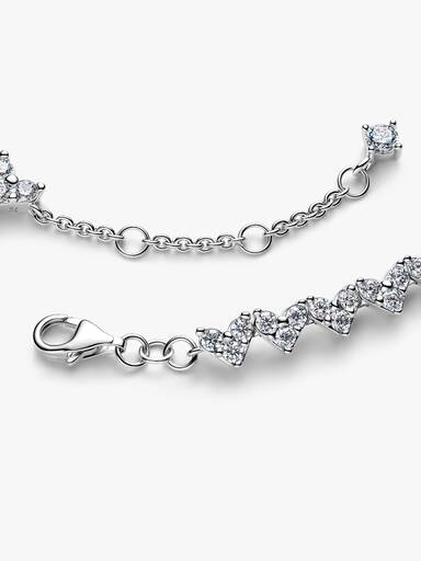 Armband med hjärta och tre stenar