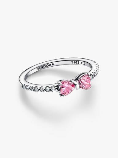 Ring med rosettformad design och två rosa stenar
