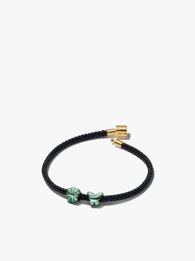 Armbandsset med snöre och miniberlocker i form av fjäril och fyrklöver