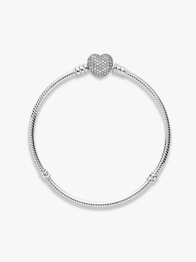 Moments glittrande ormkedjearmband med hjärtformat lås