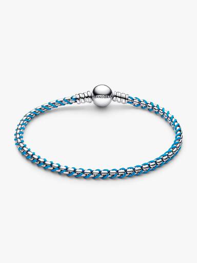 Flätat armband med turkos tygdetalj