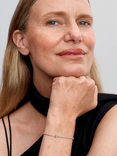 Tennisarmband med glittrande hjärta